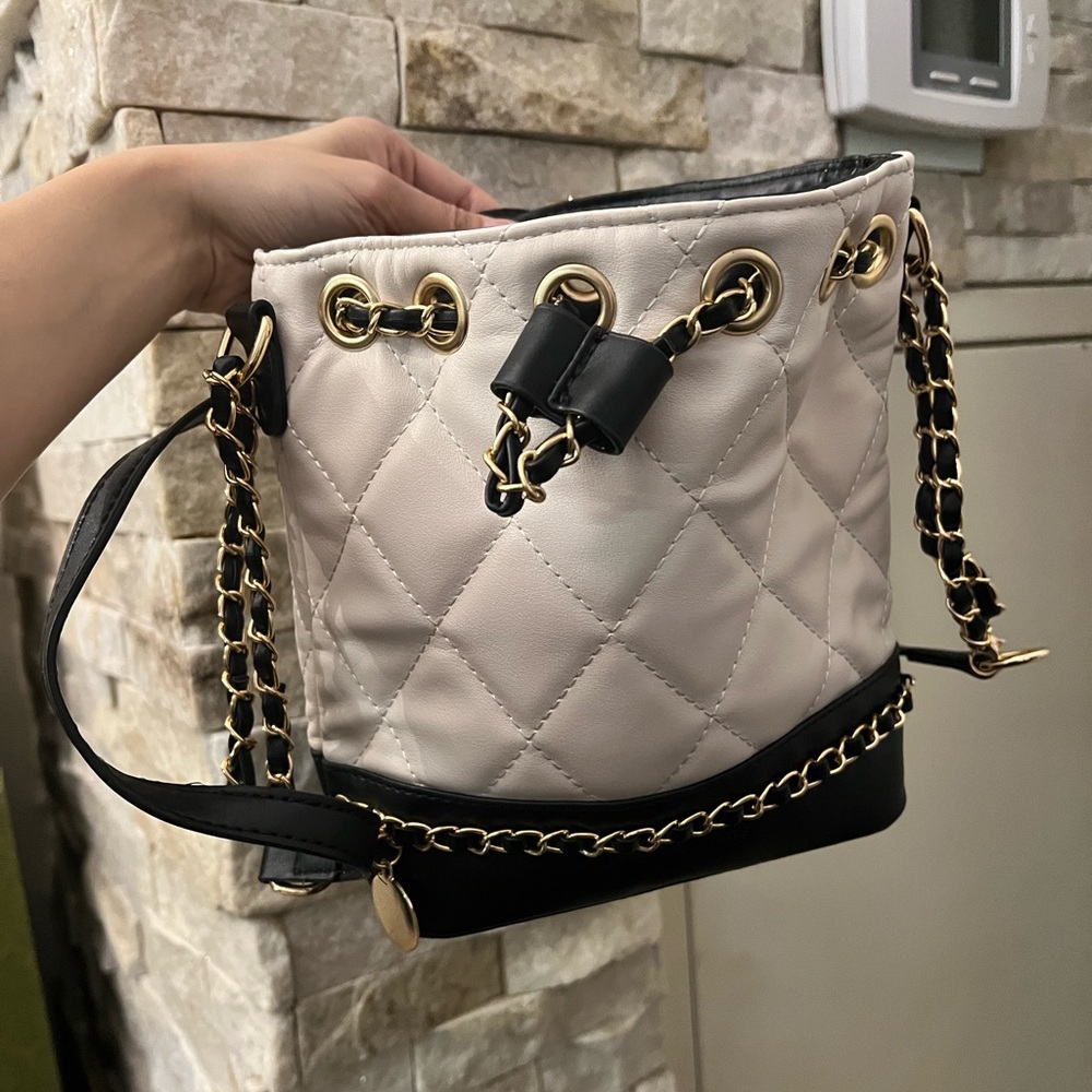 Elegant Black and Cream Quilted Bucket Bag